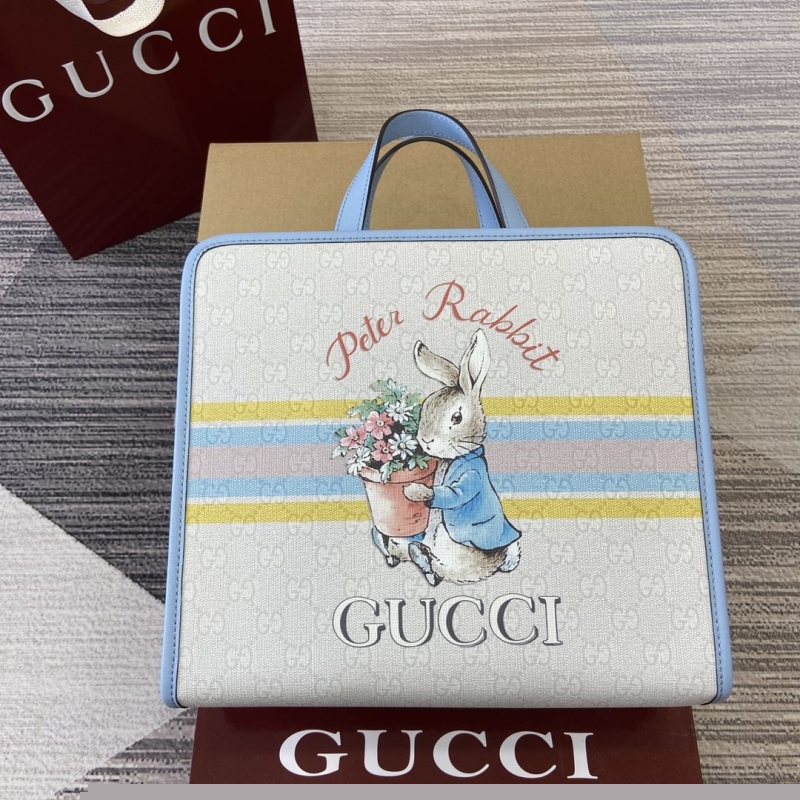 G*u*i shopping bags